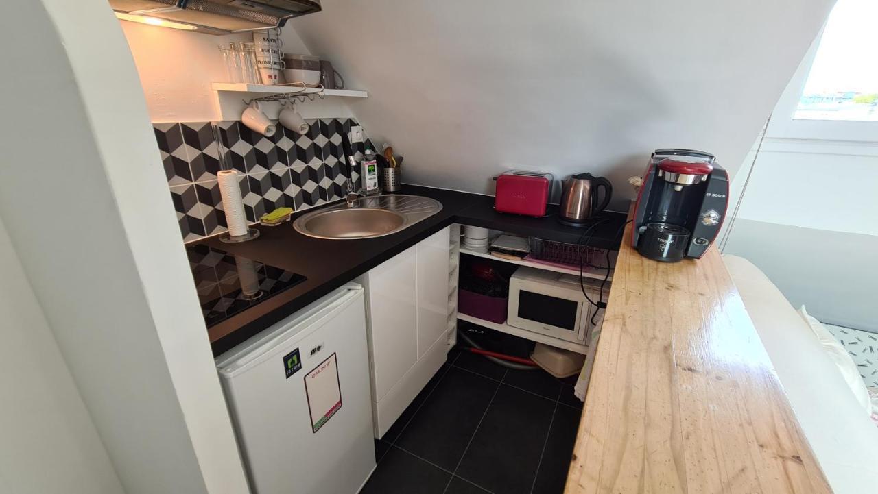 Appartement Coeur De Paris Avec Vue Sur Les Toits Dış mekan fotoğraf